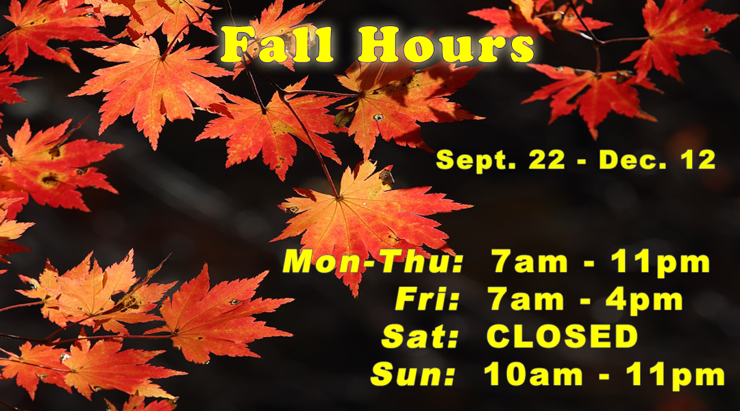Fall hours displayed on a background of orange leaves 