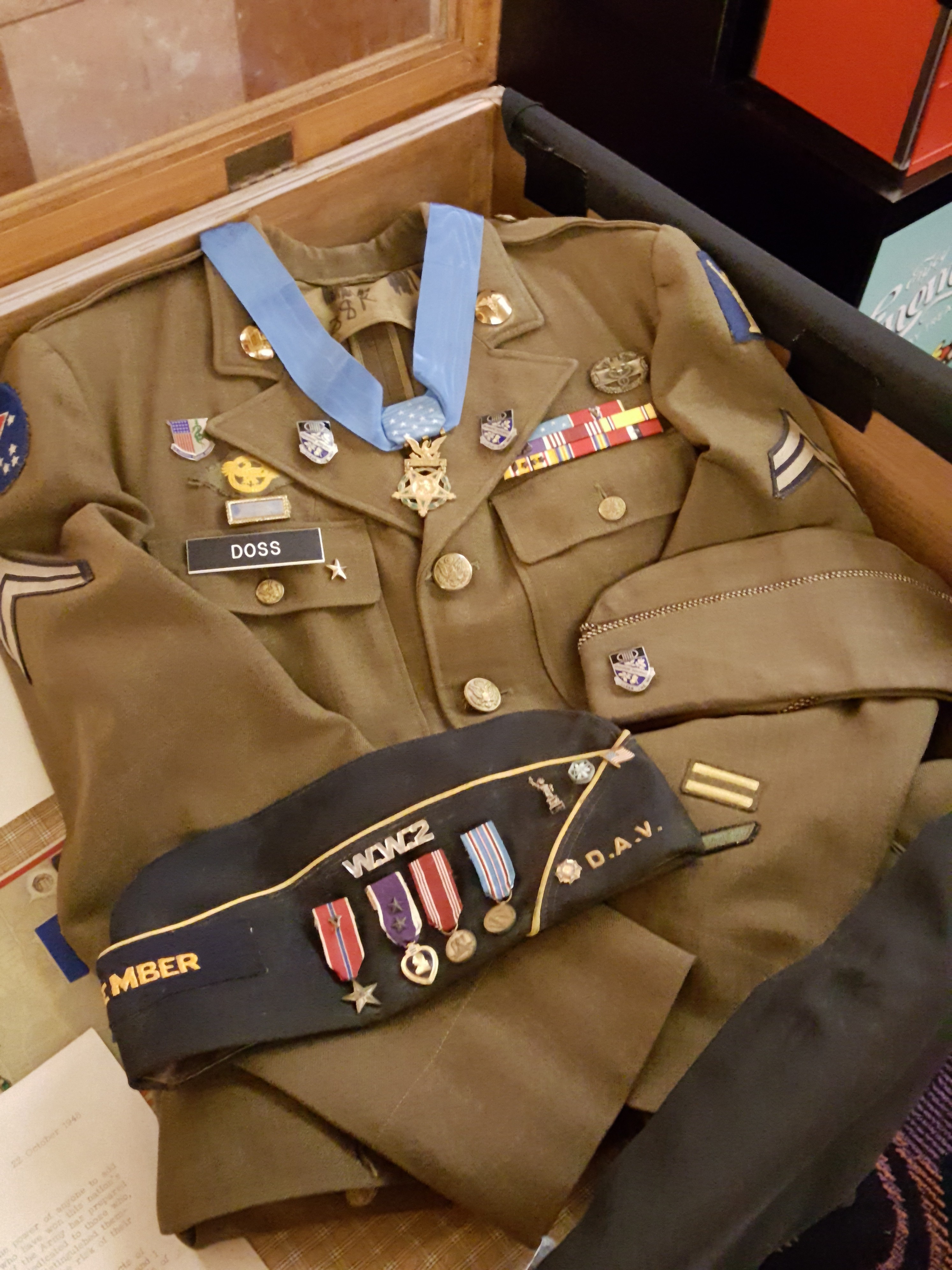 Doss's Army Service Uniform with his replacement Medal of Honor. These items were received in 2007 and will be on display in our department exhibit cases.
