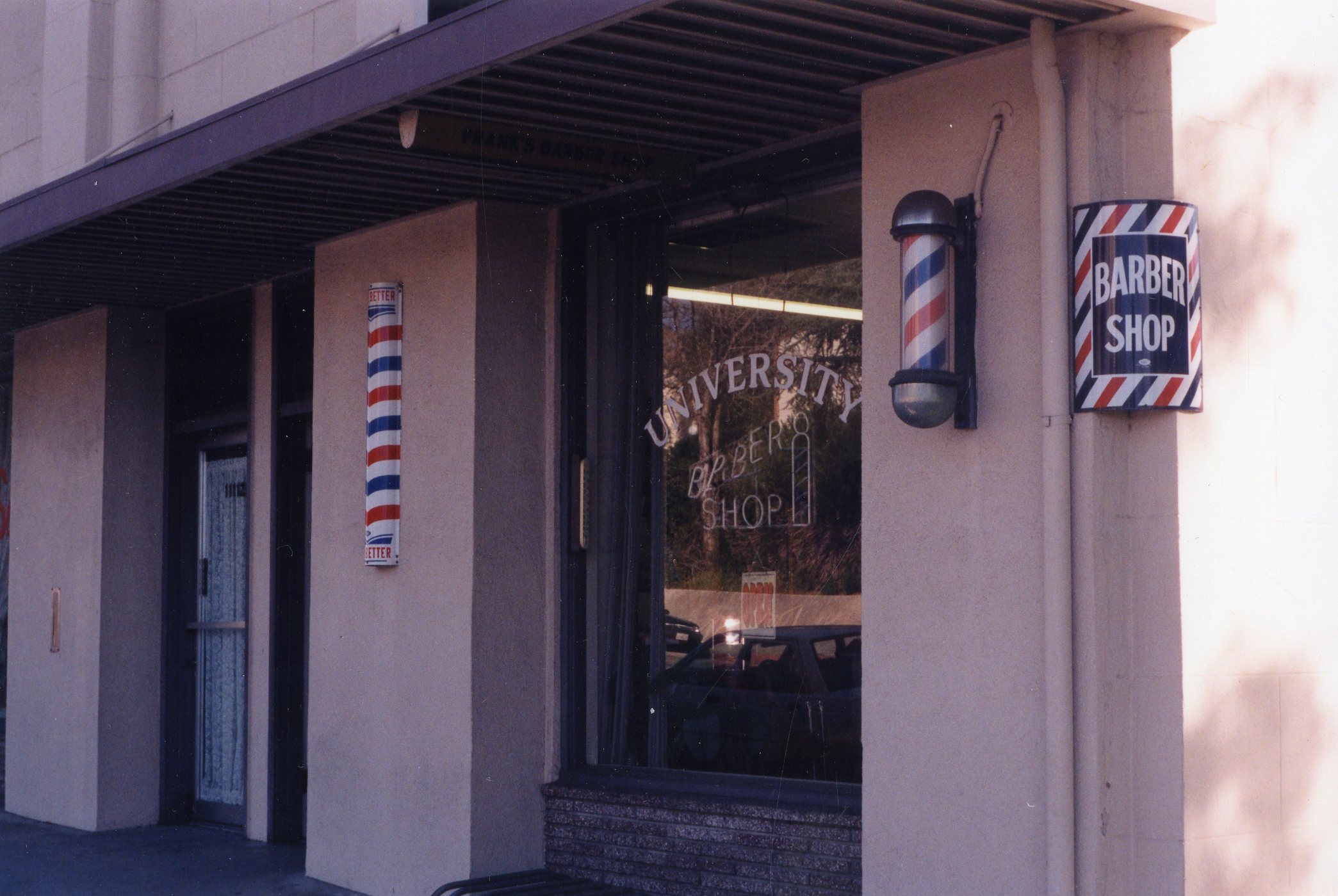 Frank's Barber Shop now known as University Barber Shop is conveniently located on Anderson Street.