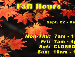 Fall hours displayed on a background of orange leaves 